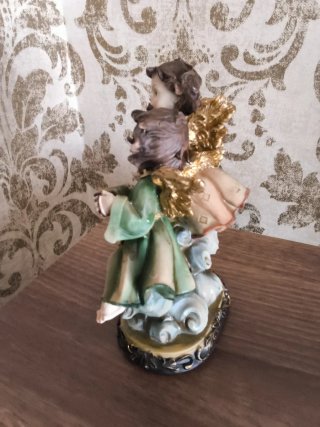 Figura dos ángeles músicos