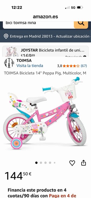 Bicicleta infantil rosa con cesta y ruedines