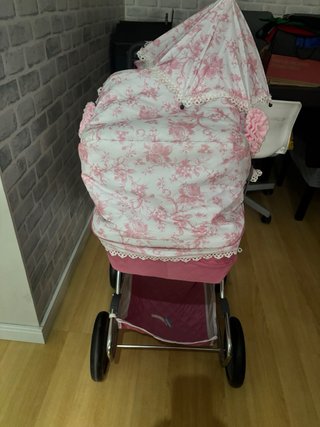 Carrito de muñecas rosa Reborn