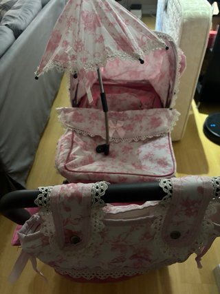 Carrito de muñecas rosa Reborn