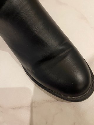 Botines negros con hebilla y cremallera