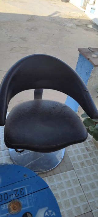 Sillón de peluquería negro