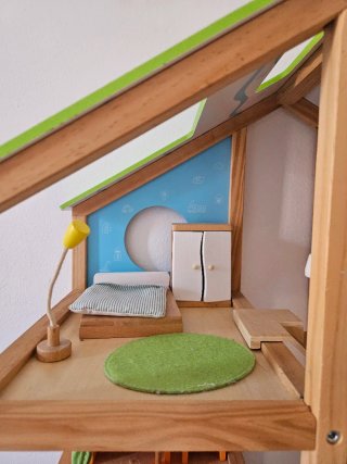 Casa de madera para niños/as con accesorios Hape