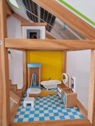 Casa de madera para niños/as con accesorios Hape