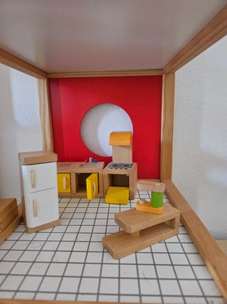 Casa de madera para niños/as con accesorios Hape