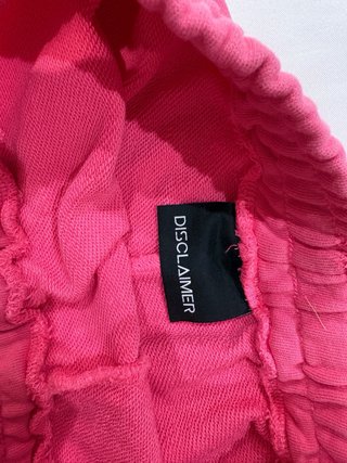 Shorts rosa Disclaimer con delfino
