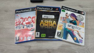 Micrófonos y juegos Singstar PS2
