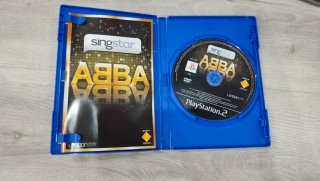 Micrófonos y juegos Singstar PS2