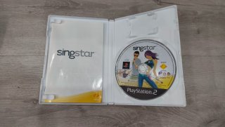 Micrófonos y juegos Singstar PS2