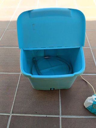 Lavadora de viaje antigua azul