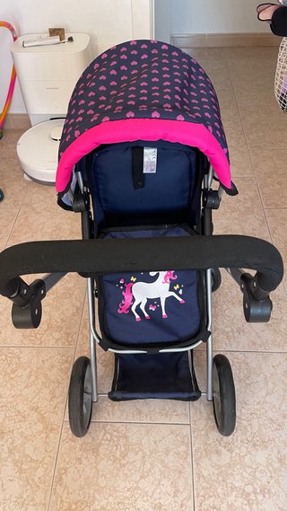 Carro de muñecas con unicornio