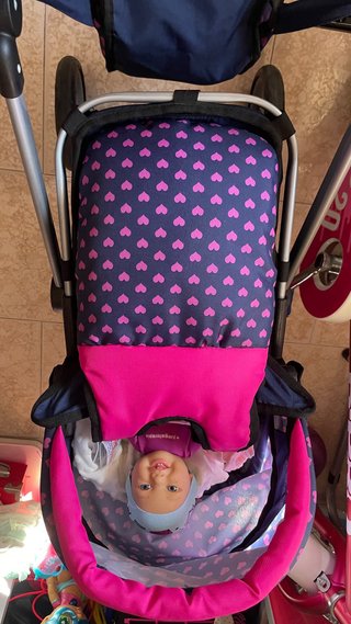 Carro de muñecas con unicornio