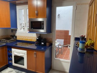 Cocina modular madera y azul