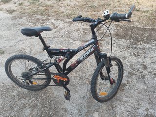 Bicicleta infantil Decathlon 20 doble suspensión