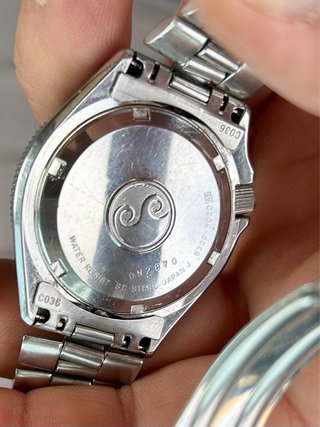 Reloj Seiko SQ100 Vintage