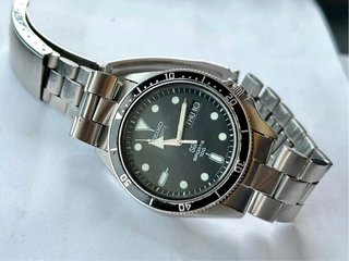 Reloj Seiko SQ100 Vintage