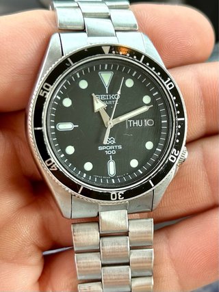 Reloj Seiko SQ100 Vintage