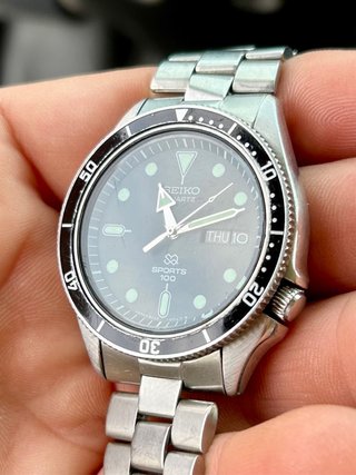 Reloj Seiko SQ100 Vintage
