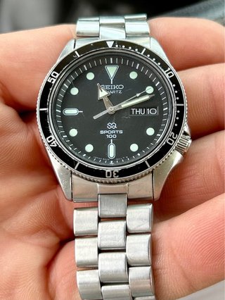 Reloj Seiko SQ100 Vintage