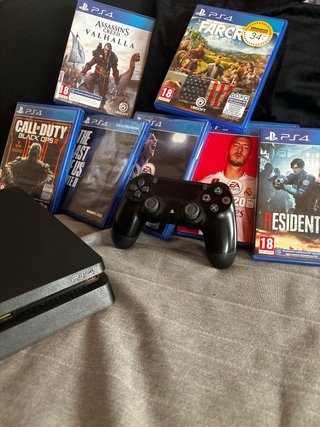 PS4 500GB con caja, mando y juegos