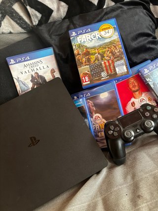 PS4 500GB con caja, mando y juegos