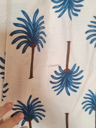 Pantalón palazzo estampado palmeras