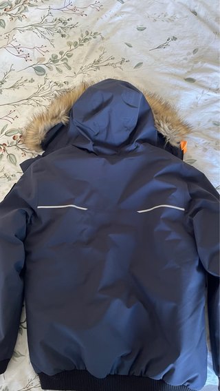 Chaqueta Quechua azul con forro naranja