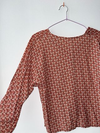 Blusa estampada manga larga