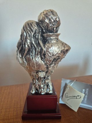 Figura de pareja bañada en plata. Arriaza