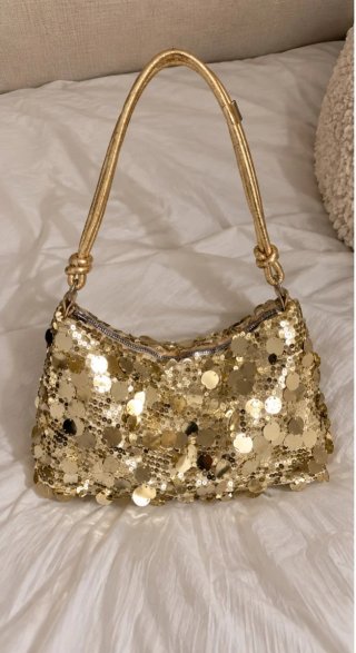 Bolsa de festa dourada com lantejoulas