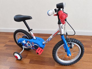 Bicicleta infantil B'TWIN Calipo 14 con ruedines