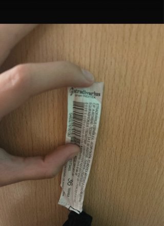 Pantalón negro Stradivarius con cinturón
