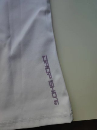 Camiseta pádel Dropshot blanca y morada