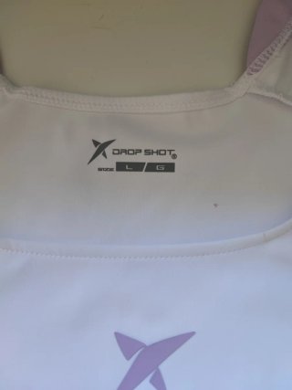 Camiseta pádel Dropshot blanca y morada