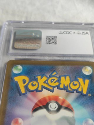 Charizard 2023 Autografiado por Arita
