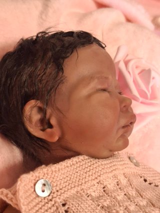 Muñeca silicona