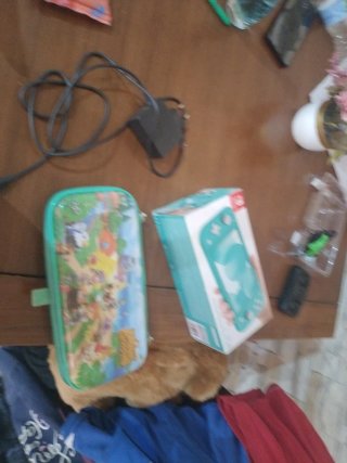 Nintendo Switch Lite con caricatore e custodia