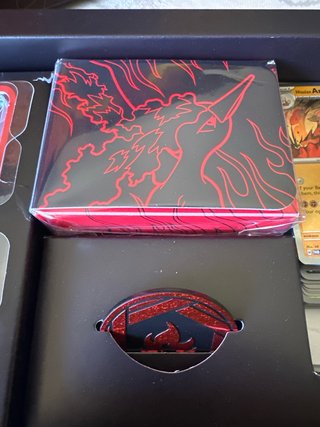 Team Rocket’s Moltres Ex Ultra Premium Collection