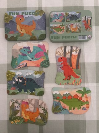 Puzzles de dinosaurios en estuche