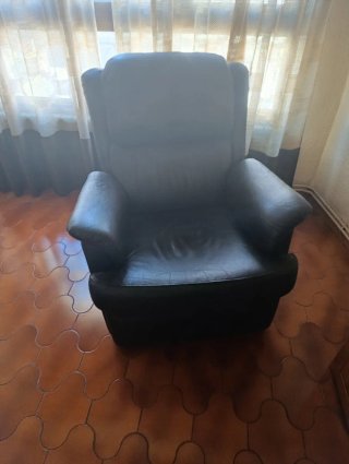 Sillón mecedora de piel