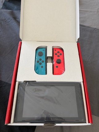 Nintendo Switch V2 + Extra