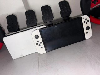 Nintendo switch con 2 volantes i 2 pedales y juego