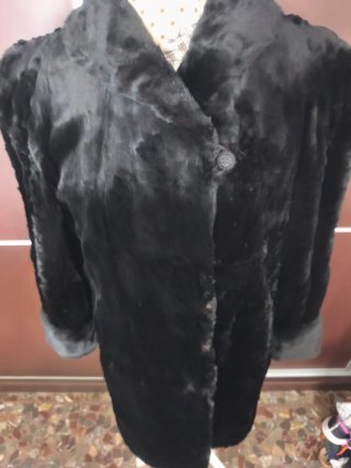 Elegante abrigo de pelo vintage