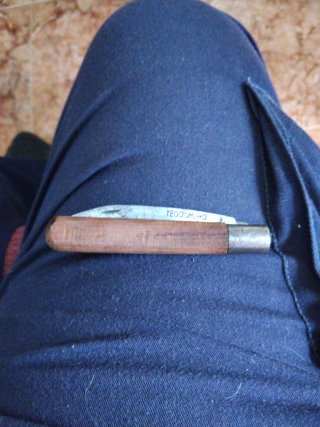 Abrecartas antiguo de madera y metal
