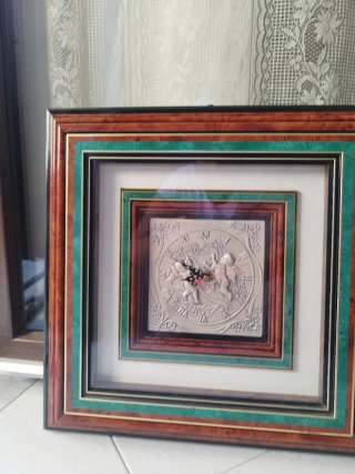 Orologio da parete in legno e argento 925