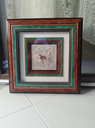 Orologio da parete in legno e argento 925