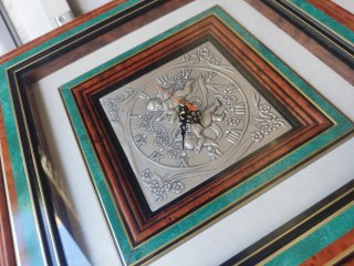 Orologio da parete in legno e argento 925