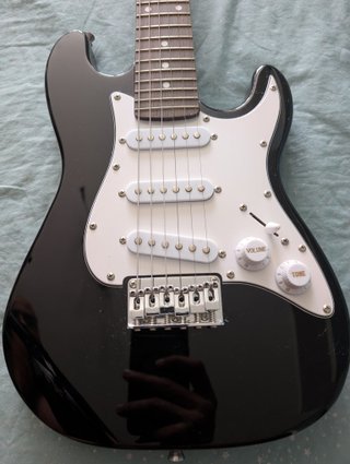 Set Guitarra Eléctrica Junior y Amplificador