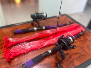 Caña de pesca telescópica púrpura