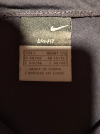 Camiseta Nike Mujer Gris.Estado impecable.Original